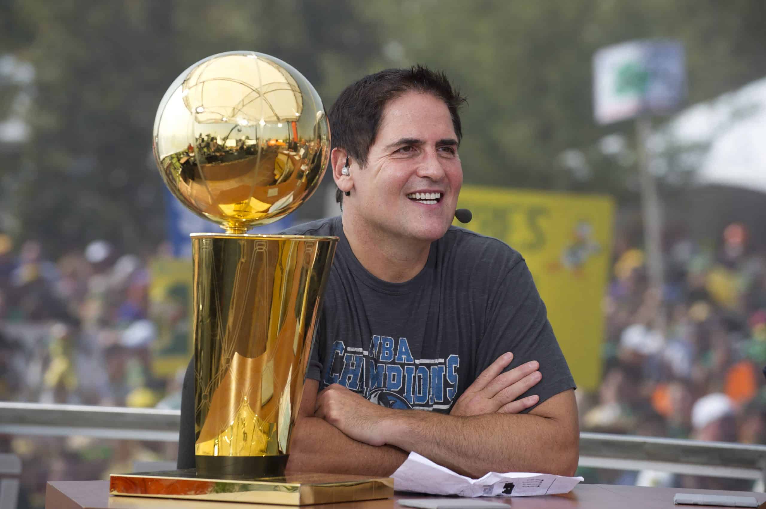 image of Mark Cuban with trophy digital land